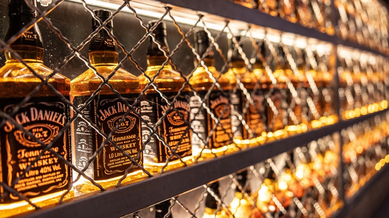 Rows of Jack Daniels bottles.