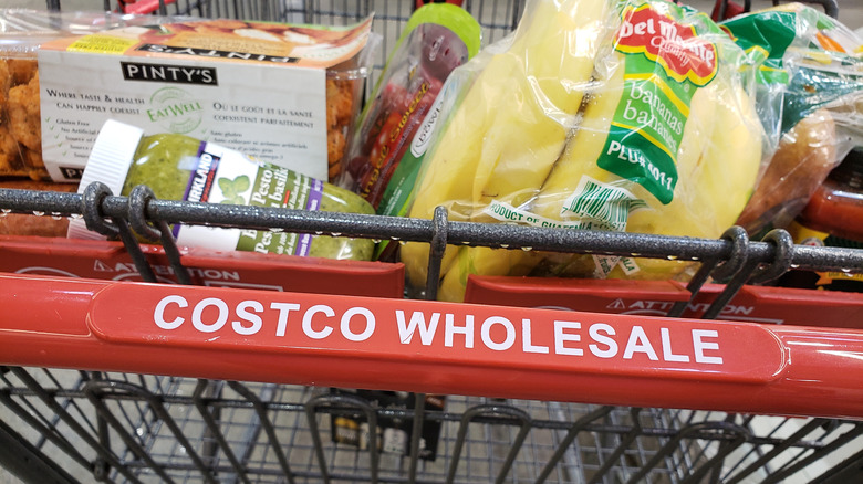 Costco wholesale shopping cart with produce