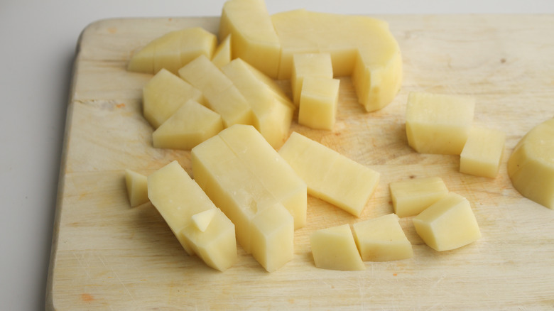 potatoes on a cutting board 