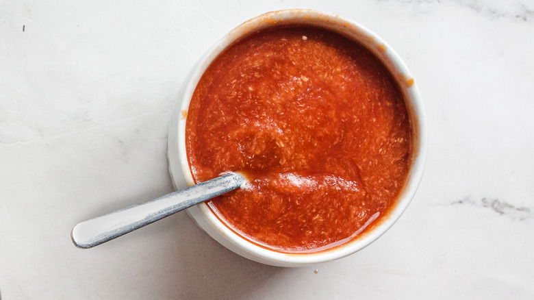 red sauce with spoon