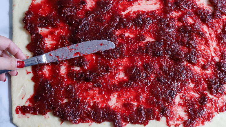 Close up of cranberry filling in cinnamon rolls 