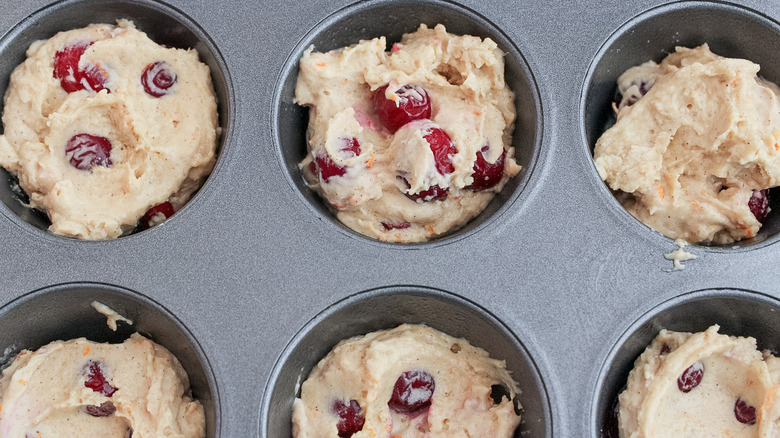 cranberry muffin batter in pan