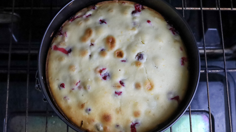 cranberry cake in oven