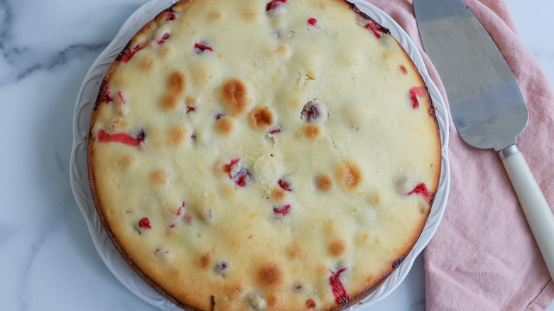 cranberry cake with pink napkin