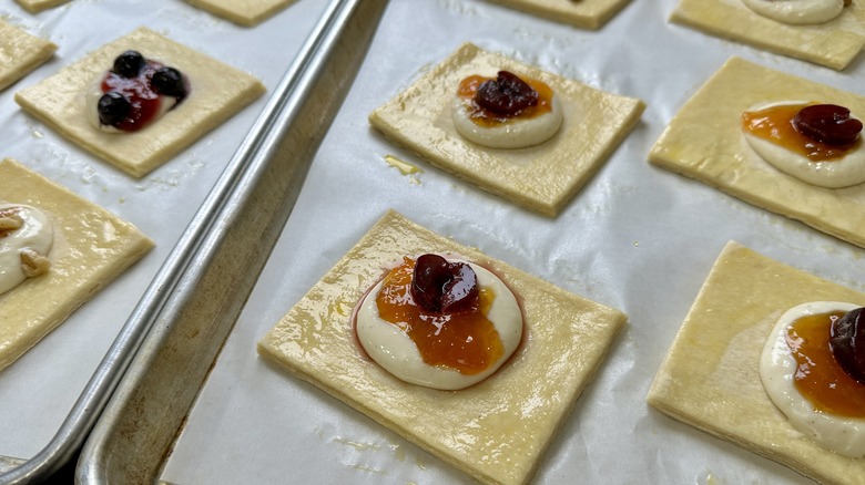 prepped danishes on baking sheet