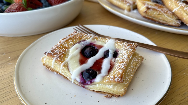 cheese fruit danish on plate