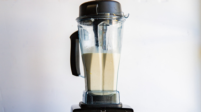 Smooth milkshake in blender