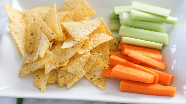 tortilla chips, carrots, and celery