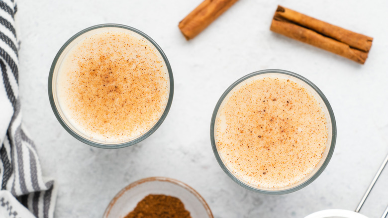 creamy drinks with nutmeg garnish