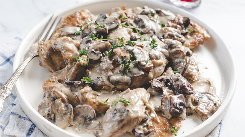 Chicken on plate with fork