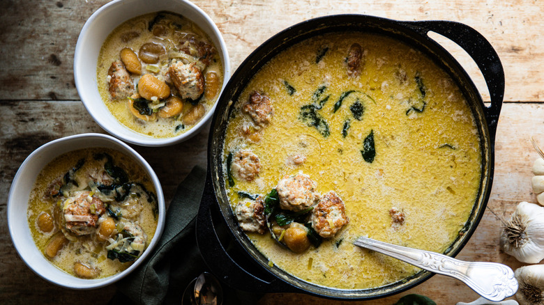 Pot of creamy pumpkin gnocchi soup