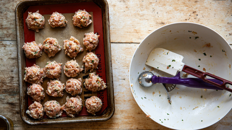 Forming mini chicken meatballs