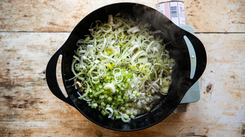 Mirepoix added to soup pot