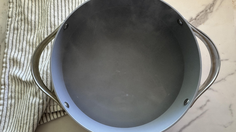 A pot of water steaming