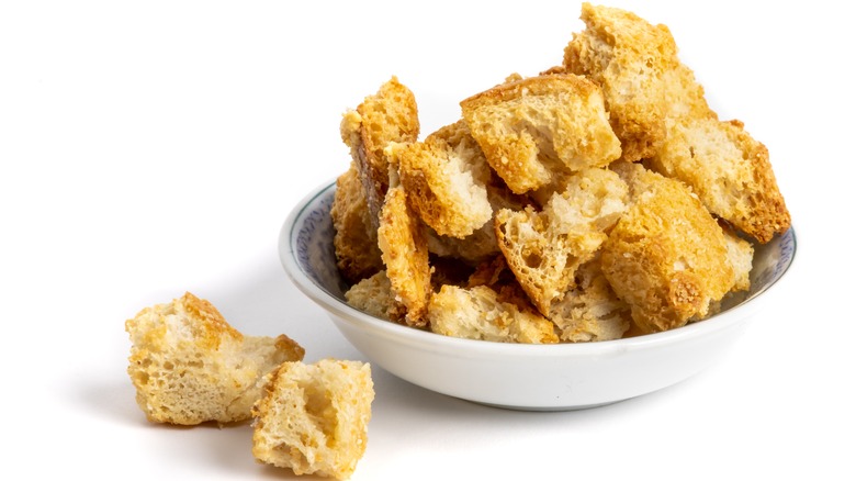 Toasted croutons on a white background