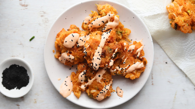 fritters with sauce and seeds