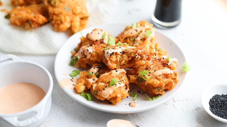 fritters with sauce and seeds