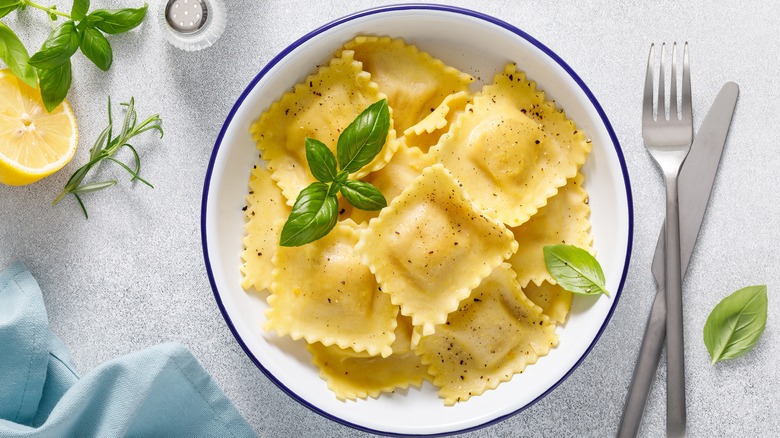 Ravioli with basil on plate