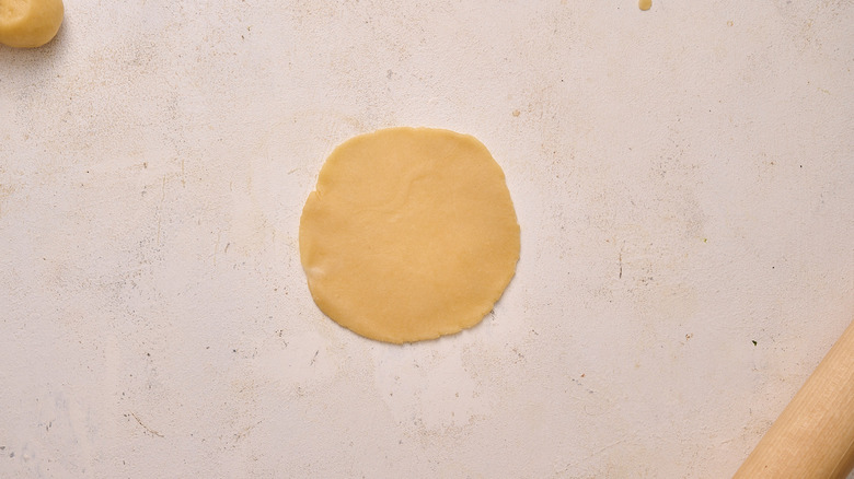 dough rolled into circle