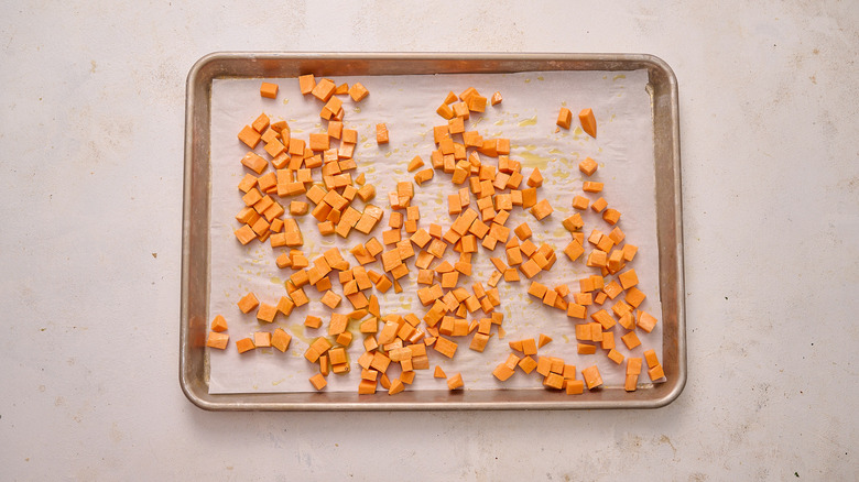 diced sweet potatoes on sheet tray