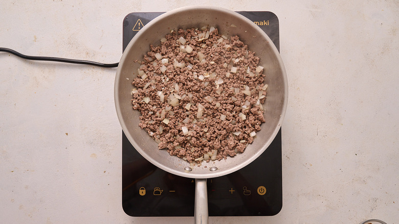 onion and garlic in skillet