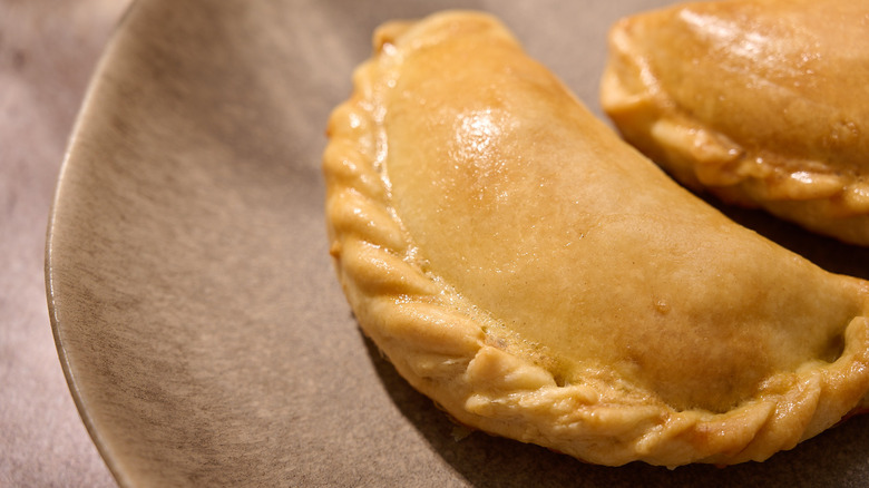 folded empanada on plate