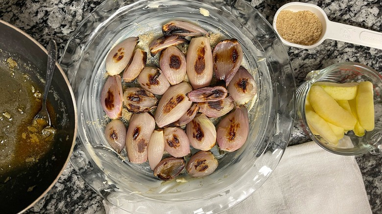 cooked shallots in pie pan