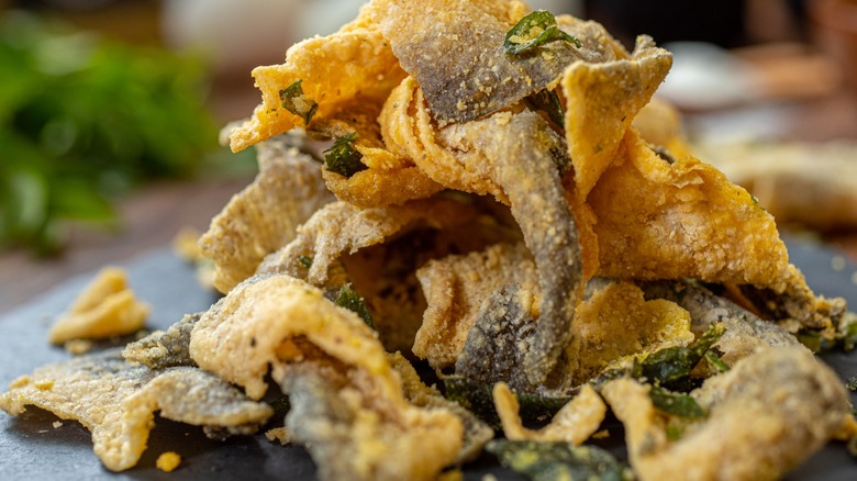 Close-up of salted egg fried salmon skin