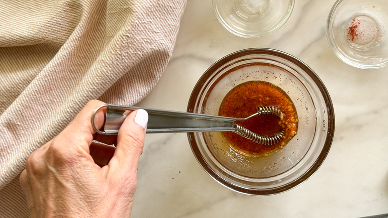 whisk in glass bowl