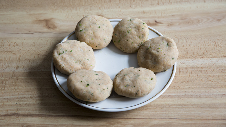 uncooked aloo tikki on plate