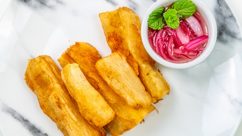 yuca fries with pickled onion sauce