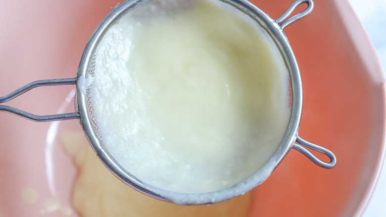 white cream in strainer