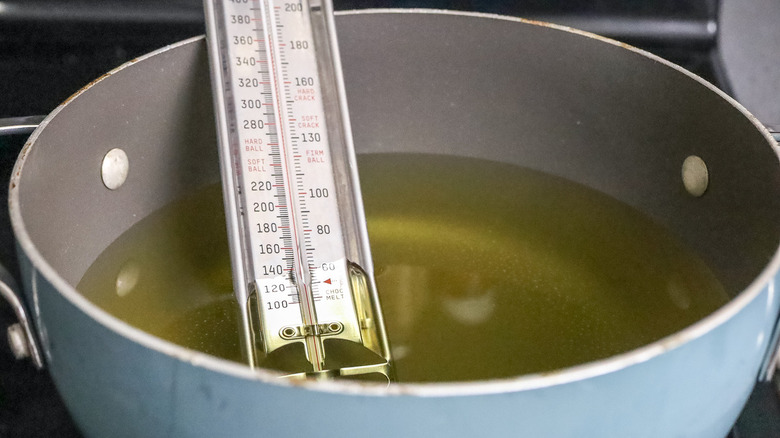 oil in pot with thermometer