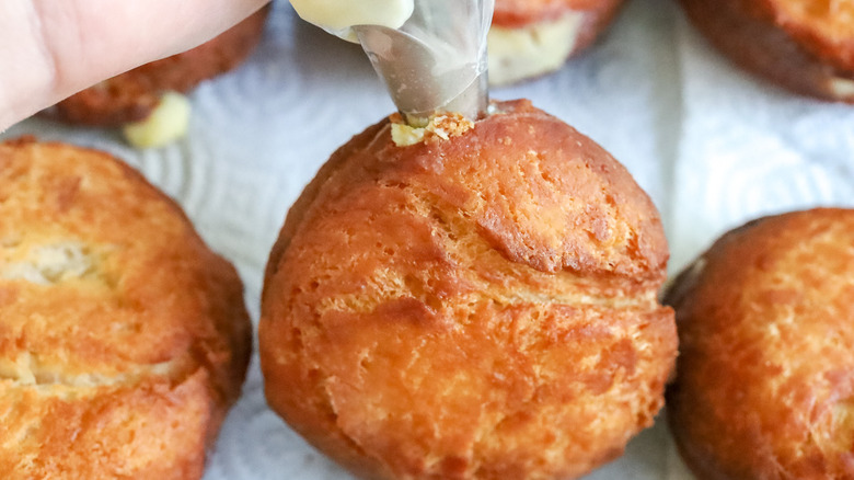 piping bag filling donut