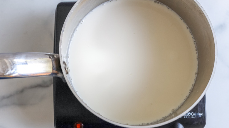 milk in metal pot