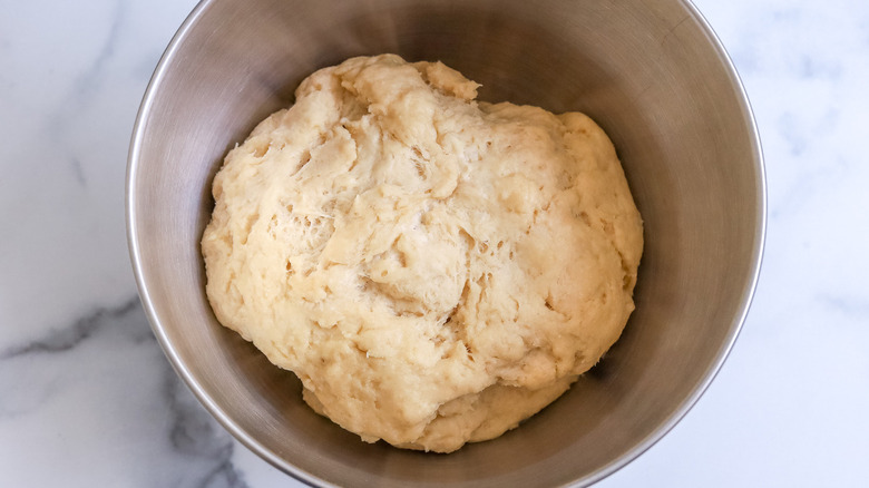 dough in metal bowl