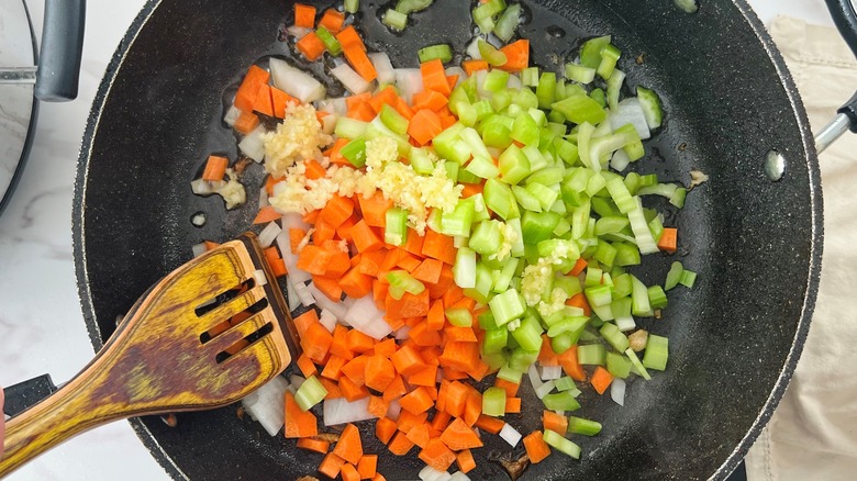 vegetables sauteing in pan