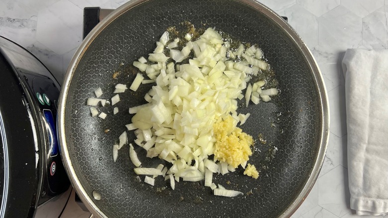 onions and garlic in pan