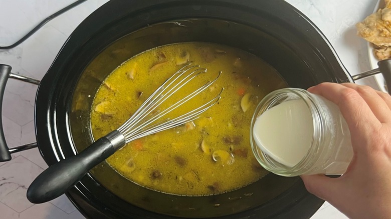 Heavy cream being added to crock pot