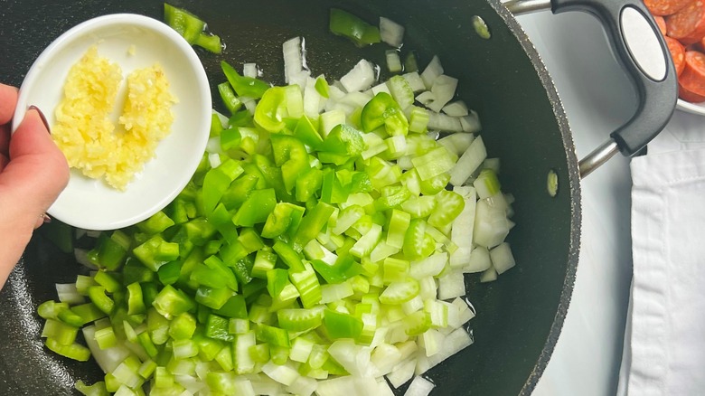 cooking onion pepper celery garlic in pan