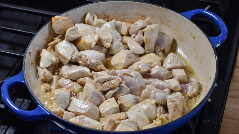 searing cubed chicken breast in skillet