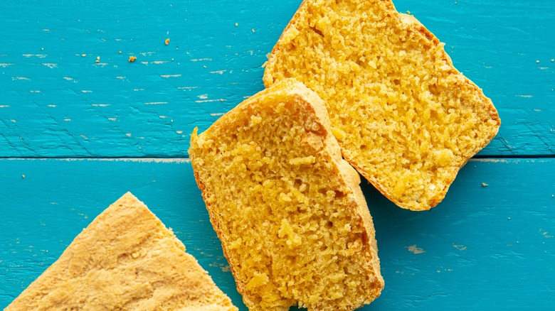 cornbread slices on blue wood