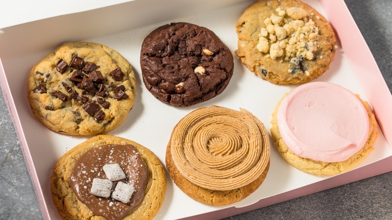 Crumbl cookies in a pink box