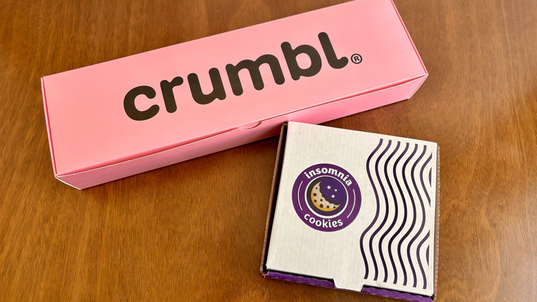 Crumbl Cookies and Insomnia Cookies boxes