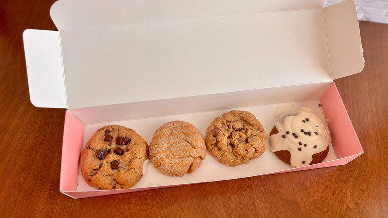 four cookies in long box