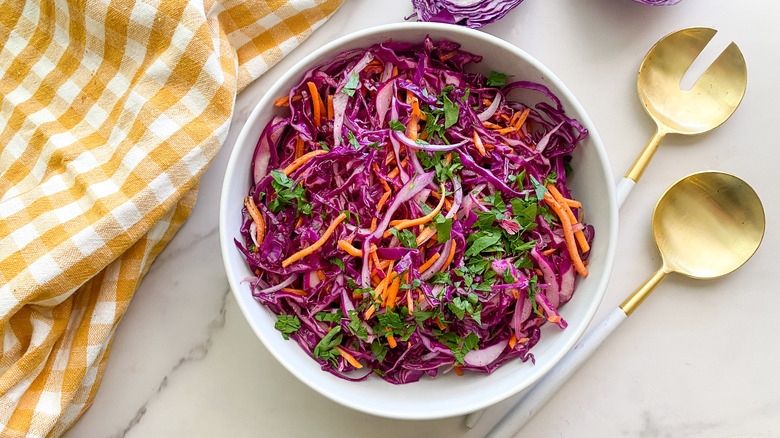 finished salad in white bowl