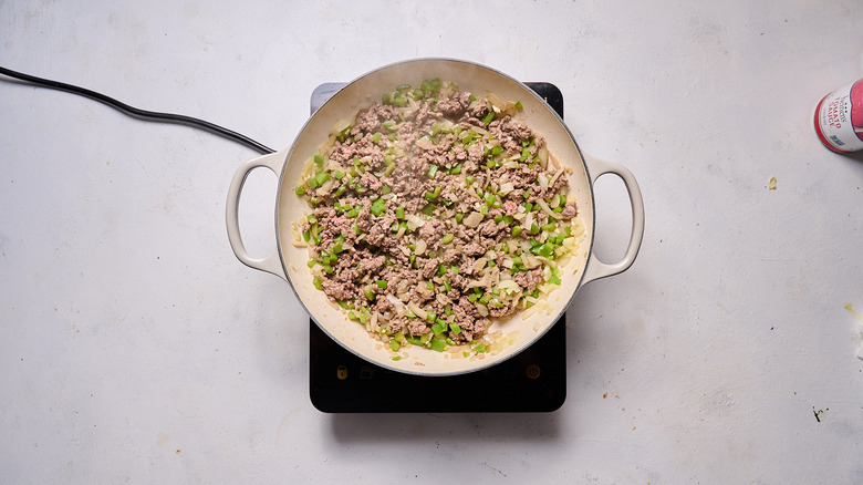 browned beef  and sofrito in skillet