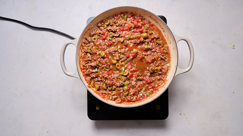 simmering picadillo in skillet