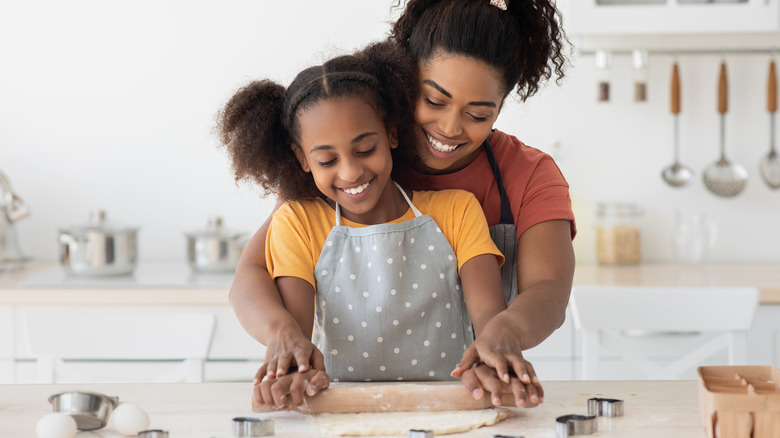 Mom and daughter baking