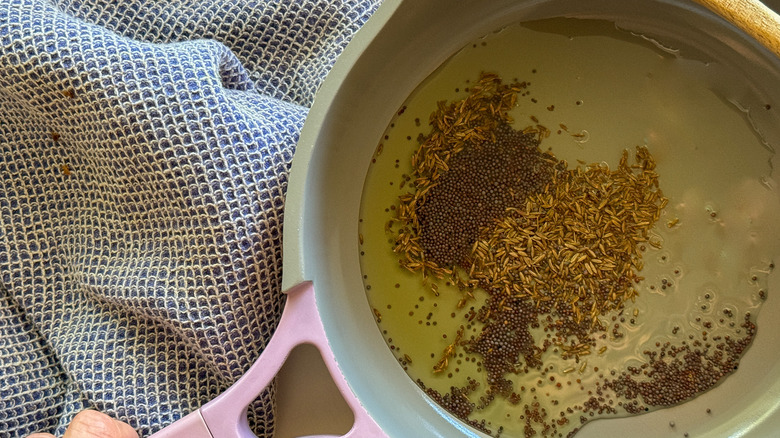 seeds in pan with oil